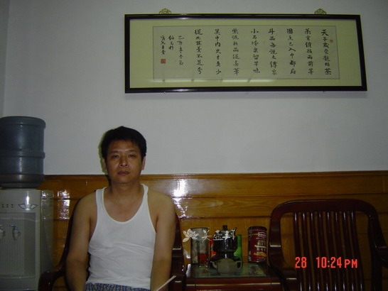 紫砂壶艺师图片：丁一民 