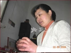 紫砂壶艺师图片:周祥华