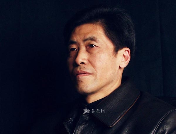 紫砂壶艺师图片:强德俊