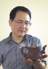 紫砂壶艺师图片：顾余根 