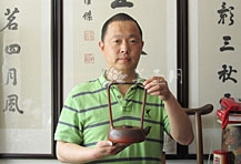 紫砂壶艺师图片：丁小明 